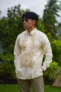 Model wearing the Antonio Barong Tagalog in cream – traditional Filipino men’s attire styled for wedding guests