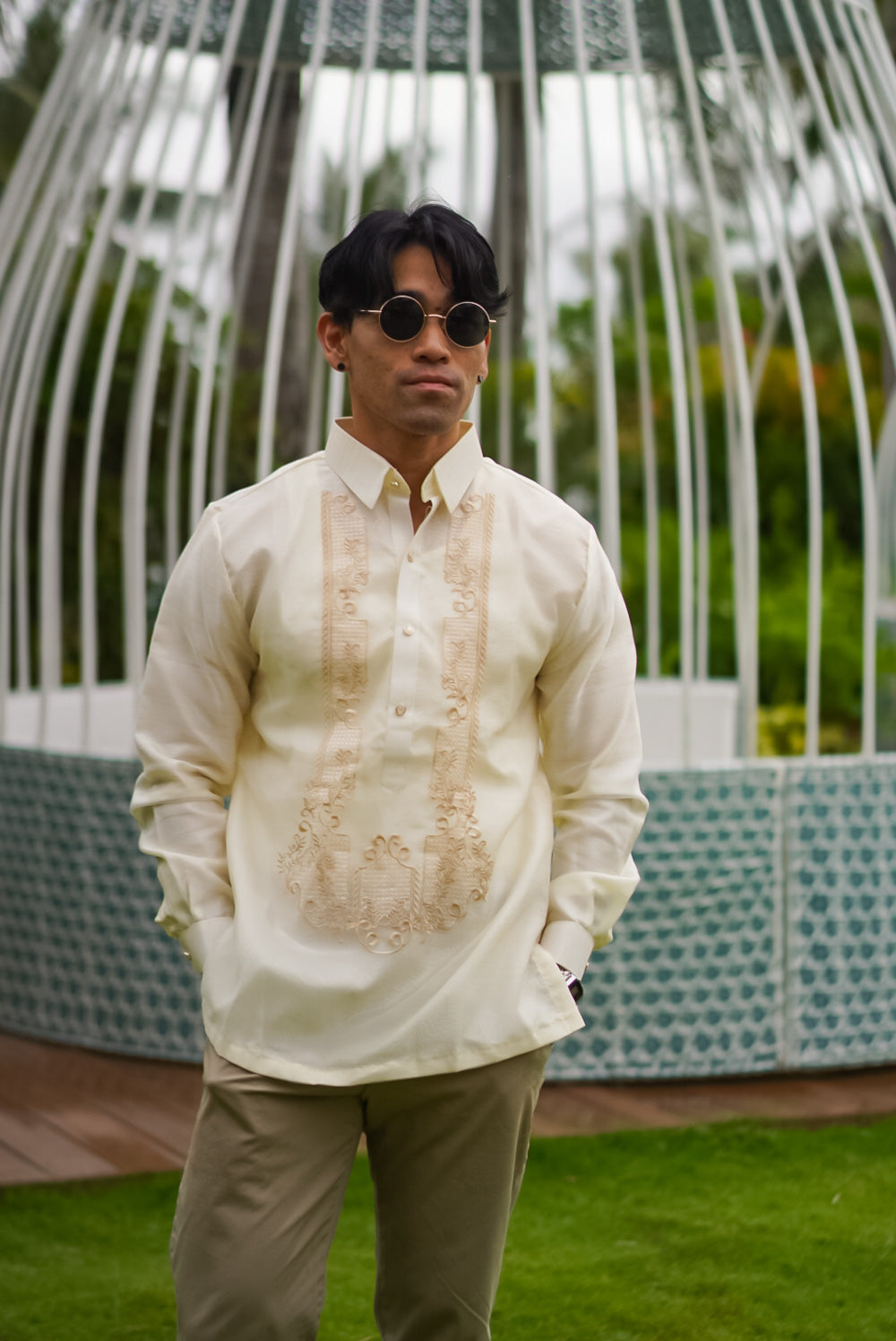 Men’s Barong Tagalog paired with tan trousers – formal Filipiniana outfit