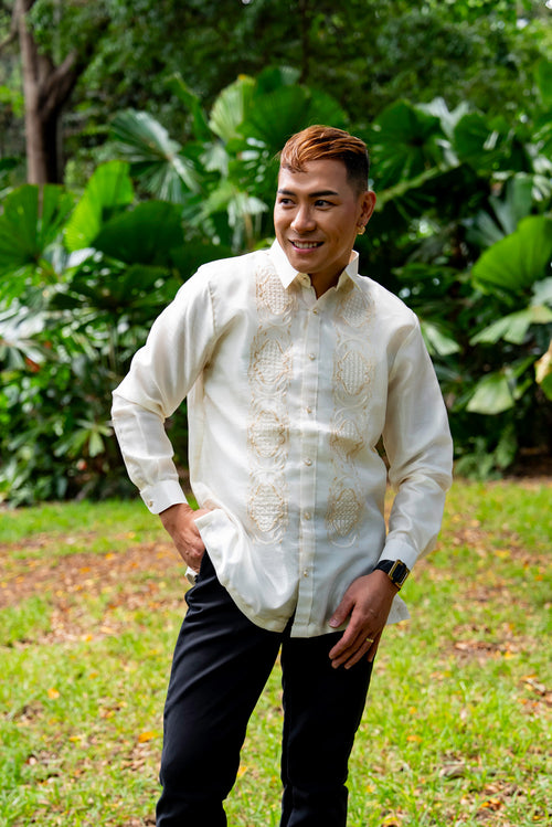 Model wearing Benicio Barong Tagalog in cream organza with traditional embroidery
