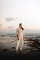Filipiniana Barong shirt styled with white linen pants for modern professional wear